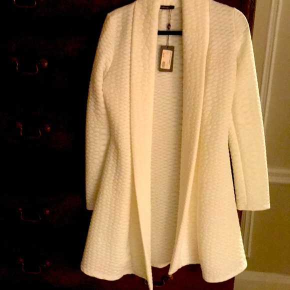 White “Bubble Coat.” Never worn. Sales tags attached. - Picture 1 of 3